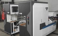 Machine de cerclage pour carton ondulé