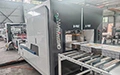 Machine de cerclage pour carton ondulé
